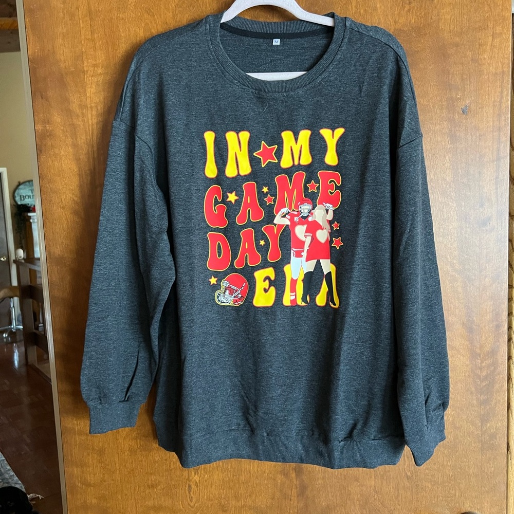 Taylor Swift and Travis Kelse Era sweatshirt size Medium NWOT. Never worn.